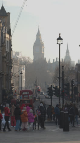 Vertical-Video-Of-View-Along-Whitehall-From-Trafalgar-Square-With-Big-Ben-And-Busy-With-People-And-Traffic